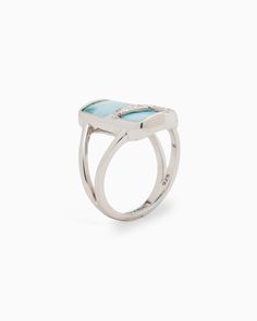 The Stone Ring is a breathtaking style that is guaranteed to capture attention. Handcrafted from sterling silver, this ring showcases an elegant ribbon design adorned with our distinctive reef texture, set against a rectangular larimar cabochon. Wear this ring solo for a statement look or pair it with others for a more personalized touch. Metal: Sterling silver Stone: Larimar Band Width: 3mm Stone Size: 20mm x 10mm Style #: OR190L Elegant Sterling Silver Turquoise Ring With Polished Finish, Elegant Sterling Silver Turquoise Ring, Elegant Polished Sterling Silver Turquoise Ring, Elegant Turquoise Larimar Ring As Gift, Elegant Sterling Silver Turquoise Ring For Formal Occasions, Luxury Ring With Polished Finish And Rectangular Stone, Elegant Silver Turquoise Ring With Polished Finish, Elegant Larimar Jewelry For Formal Events, Elegant Larimar Rings For Anniversary