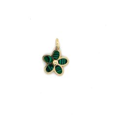 We're obsessed with these new mini gemstone flowers. They're just the right size at 1/2". They come in 5 different vibrant gemstone colors and look perfect hanging from a paperclip or bead chain! 14k Yellow Gold Choose between 5 Gemstones: Black Onyx, Turquoise, Malachite, Mother of Pearl and Carnelian Gemstone Inlay on both sides Size is 1/2" Pendant Only Choose a Chain from our Chain & Charms section to complete the look! Green Flower Charm Jewelry With Round Pendant, Green Flower Charm Round Pendant Jewelry, Green Round Pendant Jewelry With Flower Charm, Green Round Jewelry With Flower Charm, Green Jewelry With Flower Charm And Round Shape, Green Jewelry With Round Flower Charm, Dainty Green Jewelry With Flower Charm, Bead Chain, Flower Charm