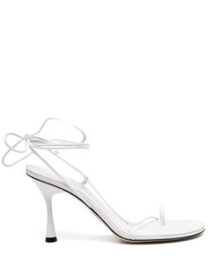 white calf leather open toe single toe strap crossover straps slingback strap branded leather footbed 90mm high sculpted heel leather outsole spare heel caps tie-fastening ankle strap This piece comes complete with a protective dust bag. Studio Amelia, Sandals White, Heel Caps, Amelie, Strappy Heels, Crossover, Calf Leather, Ankle Strap, Open Toe