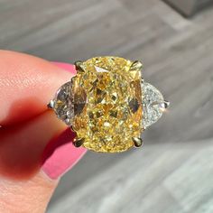 3.06ct GIA Fancy Yellow Elongated Cushion Diamond Ring – Rare Colors Luxury Yellow Pear-shaped Ring, Luxury Pear-shaped Three Stone Rings, Loui Vuttion, Large Wedding Rings, Large Diamond Ring, Dig Jewelry, Large Diamond Rings, Fancy Color Diamond Ring, Rare Colors