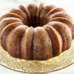 a bundt cake sitting on top of a glass plate