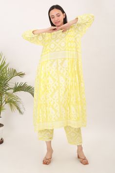 Embrace the essence of timeless elegance this summer with our exquisite handwoven Bengal Jaamdani cotton silhouettes. Crafted from lightweight fabric, these pieces offer both comfort and style, making them perfect for warm weather adventures. Size S: Bust - 38in, Waist - Free , Shoulder - 14in, Hip-Free, Sleeve-19" Size M: Bust - 40in, Waist - Free, Shoulder - 14.5in,Hip-Free, Sleeve-19" Size L: Bust - 42in, Waist - Free, Shoulder - 15in, Hip-Free, Sleeve-19" Size XL: Bust - 44in, Waist - Free, Shoulder - 15.5in, Hip-Free, Sleeve-19" Pants: Free Size : Relax-Stretch Waist: 24in-46in, Length:36 in These are garment measurements. Wash Care: Dry Clean Mulmul Anarkali Set With Dupatta, Block Print Salwar Kameez In Mulmul, Spring Yellow Anarkali Set With Chikankari Embroidery, Yellow Anarkali Set For Spring, Spring Block Print Chanderi Salwar Kameez, Spring Chanderi Block Print Salwar Kameez, Summer Straight Kurta With Cutdana, Bollywood Style Straight Kurta Lawn Suit For Summer, Bollywood Style Summer Lawn Suit With Straight Kurta