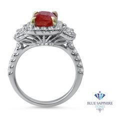 One of a kind untreated ruby three stone ring surrounded by a diamond halo and diamond studded band Great as an engagement ring or anniversary present! GIA certified! Ruby and white gold are a match made in jewelry heaven. We cannot get enough of this combination - the hues compliment each other quite perfectly! If you're looking for the ring of your (or your significant other's) dreams, then look no further. This is the perfect ring to have when you're ready to pop the question. The center ston Luxury Ruby Ring With Diamond Halo, Gia Certified Diamond Ruby Ring For Anniversary, Anniversary Gia Certified Ruby Diamond Ring, Red Diamond Ring With Halo Setting In Platinum, Red Ruby Ring With Halo Setting In Platinum, Gia Certified Lab-created Ruby Diamond Ring For Anniversary, Gia Certified Lab-created Ruby Diamond Ring For Wedding, Gia Certified Lab-created Ruby Diamond Wedding Ring, Anniversary Gia Certified Lab-created Ruby Diamond Ring