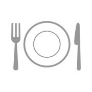 a white plate with silverware next to a fork and knife on a white background