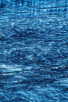 an abstract blue background that looks like wood