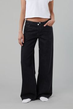 The Cool jean is a relaxed leg, low-rise jean with an adjustable drawstring toggle. The Cool has no waistband (yes, no waistband.) It features a traditional button fly, custom hardware and signature 'SH' embroidery. Runs large Suggests sizing down Relaxed leg Low-rise 32" inseam Hand wash cold, line dry 100% Cotton Wear with Western Shirt | Washed Black Drawstring Jeans, Low Rise Jean, Day Designer, Straight Leg Denim, Western Shirt, Everyday Dresses, Dark Wash Denim, Light Wash Denim, Wide Leg Denim