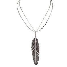 Michael Aram was inspired to create the Feather jewelry collection after he discovered a feather in the sand one morning while walking along a beach. The motif embodies movement, lightness and grace, with a modern and playful flair."The feather I found on the beach, glistening, wildly articulated, full of movement, was both fragile and elegant. The feather was ravaged by the wind and elements, yet still beautiful and graceful. A testament to strength and resilience." Feather Pendant Necklace, Necklace With Diamonds, Large Pendant Necklace, Michael Aram, Feather Necklace, Feather Jewelry, Feather Pendant, Silver Feather, Band Jewelry