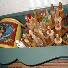 an assortment of bottles are sitting on a shelf