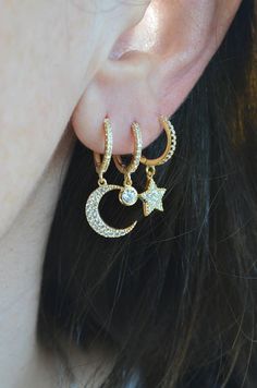 Gold charm hoops, cz gold hoops, small cz hoops, gold star hoops, crescent moon hoops, small hoops, cz star hoops, cz crescent moon hoops Celestial Huggie Hoop Earrings For Everyday, Gold Celestial Small Hoop Huggie Earrings, Celestial Style Huggie Earrings With Star Charm, Celestial Small Hoop Huggie Earrings, Elegant Gold Hoop Earrings With Star Charm, Small Hoop Celestial Earrings With Moon Charm, Gold Moon-shaped Pierced Hoop Earrings, Celestial Huggie Hoop Earrings, Gold Small Hoop Earrings With Moon Charm