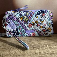 Brand New Rfid Tech Wristlet In Signature Cotton Pattern Maddalena Paisley Soft This Slim Wristlet Has Just The Right Amount Of Organization. Carry It By Itself Or Tuck It Into A Larger Bag. Our Cotton Is Colorful And Lightweight Provides Rfid Protection For Credit And Debit Cards Features Four Card Slip Pockets And One Slip Pocket Zip Closure. Dimensions: 8.0" W X 4.25" H With 6.0" Wrist Strap Cotton Wallet, Coin Purse Keychain, Purple Punch, Rose Bag, Quilted Wallet, Vera Bradley Wallet, Id Wallet, Coin Purse Wallet, Debit Cards