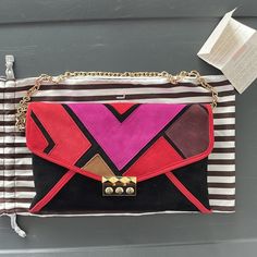 Henri Bendel - Black Red Fuchsia Suede Shoulder Bag With Gold Chain. Brand New Inside And Out, Never Used, Tags Attached, With Dust Bag. Multicolor Leather Shoulder Bag With Chain Strap, Multicolor Leather Bag With Chain Strap, Multicolor Shoulder Bag With Magnetic Closure For Evening, Chic Multicolor Clutch With Chain Strap, Formal Multicolor Shoulder Bag With Chain Strap, Multicolor Chain Strap Shoulder Bag For Formal Occasions, Chic Red Clutch With Gold-tone Hardware, Henri Bendel Handbags, Leopard Bag