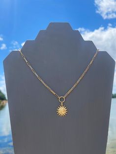 "~Hiley~ The pendant on this necklace is one of my favorites, it's so detailed. The pendant has both a detailed sun and a detailed moon on it. It hanged from a circle connector from beautiful, thick, rectangle linked chain. The necklace is size adjustable from 15\"-17\" long. All of the gold components, chain, clasp and extender chain are made of 16kt polished gold plated brass." Celestial Jewelry With Sun Design Round Pendant, Celestial Sun Design Round Pendant Jewelry, Celestial Sun Design Dangle Jewelry, Celestial Sun Design Pendant Necklace, Gold Sun Design Necklace In Metal, Symbolic Round Sun Design Necklace, Symbolic Sun Design Round Necklace, Gold Sun Necklace, Sun Jewelry