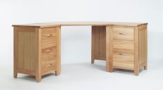 a wooden desk with three drawers on each side