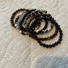 Nwot Lot Of 6 Stretch Bead Bracelets. Very Pretty Combination Of Black, Brown And White Mixed With Different Shades Of The Colors. Besds Are Not Wood Adjustable Brown Beaded Bracelets With Black Beads, Brown 8mm Beads Bracelets For Everyday, Brown Beaded Bracelets With 8mm Beads, Everyday Brown 8mm Beads Bracelets, Everyday Brown Bracelets With 8mm Beads, Casual Brown Stretch Bracelet With Natural Stones, Casual Brown Round Beads Bracelets, Brown Beaded Bracelets With Natural Stones, Casual Brown Beaded Bracelets With Gemstones