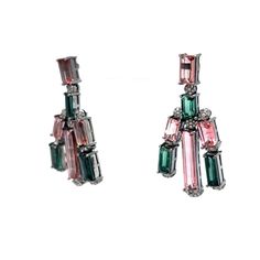 Glamourous chandelier earrings in colorful tourmaline gemstones! These inspiring modern Pink & Green Tourmaline Drop Earrings feature tourmalines and grey accent diamonds in sterling silver. The dangling gemstones are emerald cut and arranged in a unique pattern. Stylish and elegant. Clusters of pave set accent diamonds (92) punctuate the joints of the earrings. Finished on 14 karat yellow gold stud backings. Radiant & romantic. These fabulous drops bring an eye-catching movement to the neckline Formal Tourmaline Drop Earrings, Green Tourmaline Earrings, Luxury Tourmaline Earrings With Gemstone Accents, Luxury Tourmaline Drop Earrings, Luxury Multi-stone Tourmaline Earrings, Tourmaline Jewelry, Metal Shop, Tourmaline Gemstone, Shop Engagement Rings