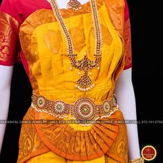 Design by Classical Dance Jewelry® ❥ Traditional Bharatanatyam costume wore during regular dance programs or arrangetram performance. ❥ Material : Art Silk ❥ Type : Traditional pant costume ❥ Easy to wear ❥ Layer front fan ❥❥❥❥ Dress Measurements in inches ( all the measurements approximately 1 margin buffer) ❥ PANT MEASUREMENTS: ☛ Pant Length: 38-40 inch ☛ Pant Waist: 35-37 inch ☛ Pant Hip: 38-39 ❥ BLOUSE MEASUREMENTS: ☛ Blouse length: 14 inch ☛ Blouse Shoulder length: 15 -16 inch ☛ Blouse arou Yellow Traditional Wear With Tilla For Navratri, Fitted Gold Traditional Wear With Tilla, Yellow Sets For Ceremonial Navratri, Yellow Ceremonial Sets For Navratri, Yellow Tilla Saree For Puja, Yellow Saree With Tilla For Puja, Yellow Ceremonial Sets For Festivals, Yellow Sets For Ceremonial Festivals, Ceremonial Yellow Traditional Wear With Motifs