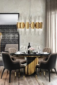 an elegant dining room with gold and black accents