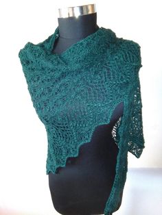 Knitted Triangle Hand Knitted Shawl, Lace Flower Shawl, Lace Shawl Handmade, Unique Hand Knitted Lace Shawl, Mother Gift, Daughter Gift This handmade shawl is knitted with soft yarn. The form is a triangle - 148 cm in length and 2 equal sides per 107 cm. You can be sure to keep yourself warm. The lovely Estonian lace pattern is created by Jenny Johnen. I like the pattern. It is very beautiful and elegant. The shawl is large enough to drape over your shoulders. Completely handmade by myself, I personally hand-knit this shawl with warmth and beauty in mind. Please hand wash gently in luke water with a delicate soap, centrifuge, and block as a triangle. Place a pin in the middle flower petal and stretch evenly between every section. It is recommended to bring out the lace pattern. Material: T Green Crochet Knitting Pattern, Bohemian Green Knitted Knitting Pattern, Bohemian Green Knitting Pattern, Hand Knitted Green Knitting Pattern, Green Yarn Knitting Pattern, Knitting Pattern For Yarn Shawl, Yarn Shawl Knitting Pattern, Knitted Lace Shawl, Knitted Triangle