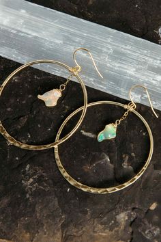 Timeless, beautiful, feminine earrings you can literally wear with anything. The dainty opals shine and flash in the light! Wear these from day to elevate your everyday look and into the night for that feminine, powerful touch. Opal is the stone of the spirit, amplifying your aura and all chakras. Opal gemstones 2" gold hammered hoops Weight: 1/4 oz Handmade in Arizona We try to match the images as best we can. All crystals & gemstones are unique & may vary in shape, size & appearance from what Feminine Earrings, Gold Chain Earrings, Spirit Soul, Hammered Hoop Earrings, Raw Opal, Into The Night, Mala Necklace, Opal Pendants, Chain Earrings