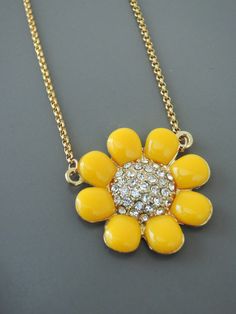 "Vintage Jewelry - Yellow Daisy Necklace - Vintage Inspired Necklace - Gold Necklace - Crystal Necklace - Chloes Vintage handmade jewelry Such a bright and sparkling necklace! A cheery bright yellow daisy flower pendant hangs from gold plated rollo chain. Such a happy piece. Chloe says, \"Wear them and feel fabulous!\" The pendant measures 1 1/4\" round. You can choose the necklace length you would like at check out. Thanks for visiting Chloe's" Yellow Daisy Flower, Crown Necklace, Vintage Jewelry Art, Sparkle Necklace, Daisy Necklace, Yellow Daisy, Catholic Jewelry, Inspired Necklace, Necklace Crystal