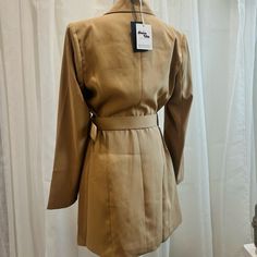 Dolce Vita Jacket In Tan Sizes S, M, L Chic Belted Blazer For Fall, Spring Double-breasted Belted Blazer, Chic Belted Long Sleeve Blazer, Elegant Brown Outerwear For Day Out, Chic Long Sleeve Belted Blazer, Spring Khaki Outerwear For Office, Khaki Spring Outerwear For Office, Khaki Long Sleeve Outerwear For Day Out, Brown Long Sleeve Blazer For Spring