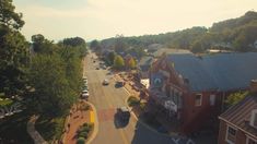 an aerial view of a small town street