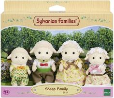 three stuffed sheep are in a box with the label on it's front and side