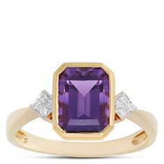 A perfectly polished octagon amethyst glimmers with a royal purple vibrancy flanked on both sides by a cluster of sparkling diamonds. The semi-bezel settings create the subtle border and complement the gemstones perfectly with 14k yellow gold. The timeless style is versatile and elegant, made with quality to wear and love for a lifetime. Elegant Purple Diamond Ring With Gemstone Accents, Emerald-cut Amethyst Ring With Gemstone Accents For Formal, Emerald Cut Amethyst Ring With Gemstone Accents For Formal, Purple Diamond Gemstones With Accent Stones, Fine Jewelry Purple Octagon Rings, Octagon-shaped Amethyst Ring For Formal Occasions, Octagon Amethyst Ring For Formal Occasions, Octagon Amethyst Ring For Formal Events, Octagon Diamond Ring With Gemstone Accents