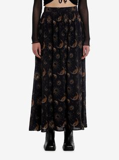 Searching for a darker celestial look? This mesh maxi skirt is printed allover with moons and suns with skulls in them  in a black and gold colorway. This skirt is fully lined and has an elasticated waist.80% polyester; 18% rayon; 2% spandexWash cold; dry lowLength: 38"ImportedListed in junior sizesModel is 5'10"Model wears size Small Soft Goth Plus Size, Plus Sized Clothing, Planetarium Outfit, Hippy Skirts, Celestial Grunge, Adult Alternative Fashion, 1999 Fashion Trends, Black Skirt Maxi, Grunge Long Skirt