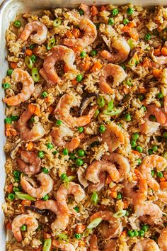 shrimp and rice casserole with peas in a pan