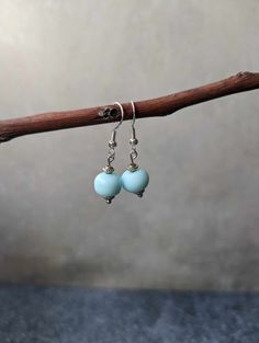 I was inspired to make these calming beautiful minimalist earrings by my beloved Lan Zhan from MDZS/The Untamed. Tell me those blues don't make you think of The Cloud Recesses!

These beauties are a perfect addition to any outfit or occasion! The one beaded earrings are lovely minimalist look while the three bead dangles are a bit more bold.

All earrings are made with .925 silver hooks. Nickel Free Light Blue Beaded Earrings For Gift, Nickel-free Light Blue Beaded Earrings Gift, Light Blue Round Bead Earrings For Gift, Light Blue Beaded Earrings Gift, Light Blue Beaded Earrings As Gift, Light Blue Beaded Earrings With Ear Wire As Gift, Elegant Light Blue Beaded Earrings As Gift, Cloud Recesses, Bead Dangles