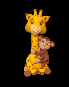 a giraffe and a monkey sitting on top of each other in front of a black background