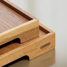 a close up of a wooden tray on a table