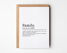 a card with the words family printed on it, in black and white texting