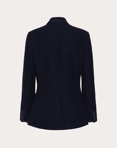 Valentino double-breasted bouclé wool jacket with VLogo Signature embroidery - Slim fit - Lined - VLogo Signature embroidery on left breast pocket as worn - Button fastening - Two front patch pockets - One left breast pocket as worn - Composition: 72% Wool, 19% Polyamide, 9% Silk - Lining: 100% Cupro - Length: 76 cm / 29.9 in. from the back of the neck in an Italian size 46 - The model is 187 cm / 6'1" tall and wears an Italian size 46 - Made in Italy The look of the model is completed by V Designer Tailored Tweed Jacket For Winter, Designer Winter Tweed Jacket, Designer Tailored Wool Tweed Jacket, Designer Wool Tweed Jacket, Designer Fitted Tweed Outerwear, Luxury Tailored Tweed Jacket With Double Button Closure, Fitted Tweed Blazer With Double-breasted Button, Luxury Double-breasted Tweed Jacket, Wool Tweed Jacket With Double-breasted Button