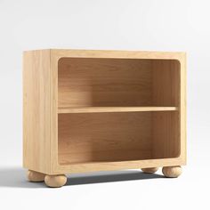 a wooden shelf with two shelves on wheels