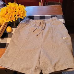 Bnwt Women's Nike Sweat Shorts Gray Nike Shorts With Pockets For Loungewear, Nike Casual Bottoms For Spring, Nike Casual Spring Bottoms, Casual Nike Bottoms For Spring, Nike Comfortable Shorts, Nike Loungewear Shorts With Pockets, Nike Lounge Shorts With Pockets, Nike Sweat-resistant Athletic Shorts For Gym, Nike Casual Gray Bottoms