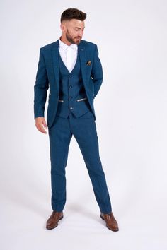 As seen on actor Tom Davis, the Dion suit will not fail to impress with its soft lapis blue tone and champagne trims. It has been created with meticulous craftsmanship using a herringbone weave and the added wool content lends a hand to durability and comfort. This heritage three piece will ensure all eyes are on you on the big day. Features Herringbone Slim fit Single-breasted Notch lapel Single back vent Four button cuff Single button blazer fastening Complimentary pocket square Waistcoat adju Three Piece Suit Mens Wedding Blue, Three Piece Suit Mens Wedding, Blue Tweed Wedding Suits, Three Piece Suit Mens, Blue Suit Men, Blue Suit Wedding, Tweed Vest, Wedding Outfit Men, Sweet Clothes