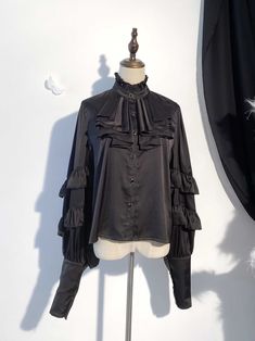 This price includes a shirt only, others are not included.   	 		 			Size 			S 			M 			L 		 		 			Bust 			115 			122.5 			130 		 		 			Shoulders 			39 			40 			41 		 		 			Full Length 			56 			60 			64 		 		 			Sleeve Length 			79 			80 			81 Black Long Sleeve Ruffled Shirt, Black Ruffled Long Sleeve Shirt, Black Ruffled Collar Top, Collared Ruffle Tops For Fall, Fall Collared Top With Ruffles, Fall Ruffled Collared Tops, Fitted Collared Tops With Ruffles, Kawaii Blouse, Black Corset Belt