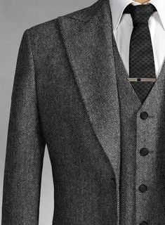 Thomas Shelby Peaky Blinders Vintage Gray Tweed Suit is a statement piece that vaunts itself with a herringbone tweed weave which has an old-school finish. Styled for a perfect gentleman, this eye-catching suit gives an on-trend yet luxurious tailored fit look. Crafted from wool, our tweed suit will create a look of Thomas Shelby from Peaky Binders ideal for when you need to look smart and confident. The sharp cut of this ensemble creates a classic yet modern style that will last a lifetime. Groom Vintage Attire, 3 Piece Tweed Suit Men, Classic Tweed Suits With Suit Collar, Winter Tweed Three-piece Suit For Work, Classic Semi-formal Suit With Herringbone Pattern, Classic Herringbone Suit For Semi-formal Occasions, Classic Semi-formal Herringbone Suit, Classic Houndstooth Suits For Winter, Classic Wool Suits With Herringbone Pattern