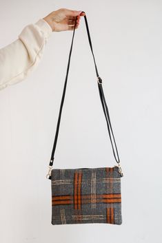 Sleek and versatile, the Tasteful Aesthetic Plaid Crossbody Bag will call in compliments everyday of the week! This chic handbag is designed with a soft knit material in a plaid print. It features a functional zipper closure, a long faux leather removable crossbody strap + a faux leather wristlet strap, and a zippered sidewall pocket on the inside. Pair the Tasteful Aesthetic Plaid Crossbody Bag with any look to add a chic touch! Available in 2 colors. Soft Knit Material Plaid Print Gold Hardwar Aesthetic Plaid, Faux Leather Wristlet, Crossbody Bag Women, Chic Handbags, Leather Wristlet, Womens Purses, Plaid Print, Knitting Materials, Crossbody Strap