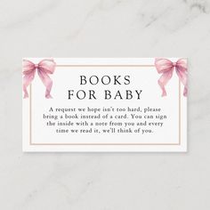 a book for baby card with pink bows on it