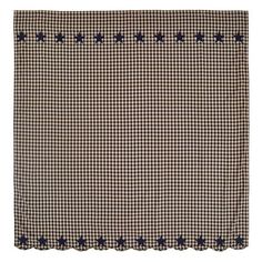 a black and white checkered table cloth with stars on the border, in various sizes