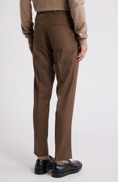 Tailored from subtly patterned wool, these all-occasion dress pants feature classic flat-front styling and a mid-rise fit that stays slim through the legs. 30 1/2" inseam; 13" leg opening; 10" front rise; 15 1/2" back rise (size 48EU) Zip fly with hook-and-bar closure Front slant pockets; back welt pockets Partially lined Unhemmed 100% wool Dry clean Imported Brown Pressed Crease Office Bottoms, Tailored Brown Bottoms For Work, Slim Fit Business Pants For Fall, Wool Flat Front Bottoms For Workwear, Wool Suits For Work With Straight Leg, Wool Suits With Straight Leg For Work, Wool Suits With Straight Leg, Business Slim Fit Pants For Fall, Fall Business Slim Fit Pants