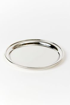 an empty silver tray on a white background