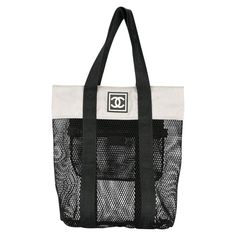 Chanel Mesh Logo Retro Sport Gym Shopper Tote Bag 2003 {VINTAGE 19 Years} Top handles Rubber printed logo at front Contrasting panels Top zip closure Internal zippered pocket 15" H x 12.2" W x 3.5" D Handle drop 8.3" Made in Italy Outfit Badminton, Badminton Outfit, Badminton Bag, Adidas Farm, Atlanta Olympics, Chanel Tote Bag, Logo Retro, Gym Tote, Chanel Brand