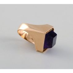 Allan Børge Larsen. Danish goldsmith (active 1967-2006). Modernist vintage ring in 14 carat gold adorned with purple amethyst. Diameter: 17 mm. US size: 6.5. In excellent condition. Stamped. Weight: 9 grams. This piece is attributed to the mentioned designer/maker. It has no attribution mark and no   official proof of authenticity,   however it is well documented in design history. I take full responsibility for any authenticity         issues arising from misattribution Modernist 14k Gold Ring For Formal Occasions, Formal Modernist 14k Gold Ring, Art Deco Amethyst Ring In Yellow Gold, Art Deco Yellow Gold Amethyst Ring, Yellow Gold Amethyst Ring In Art Deco Style, Modernist Yellow Gold Rings For Formal Occasions, Modern Yellow Gold Sapphire Ring For Formal Events, Modern Yellow Gold Sapphire Ring For Formal Occasions, Collectible Modern 14k Gold Jewelry