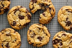 chocolate chip cookies on a cooling rack ready to be eaten by someone in the kitchen