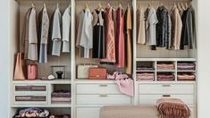 an organized closet with clothes and handbags