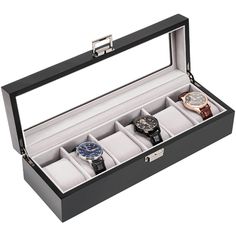 three watches are in a black box on a white background